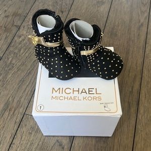 Michael Kors baby booties.